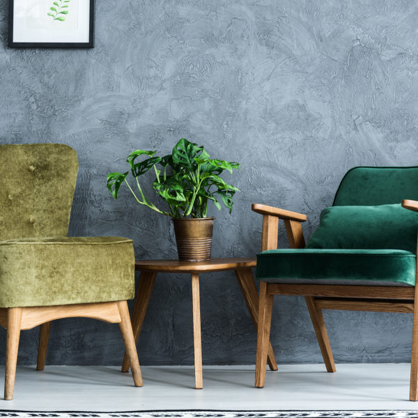 Two green armchairs in a welcoming therapy room