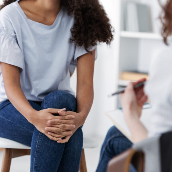 A therapist listening during a counselling session